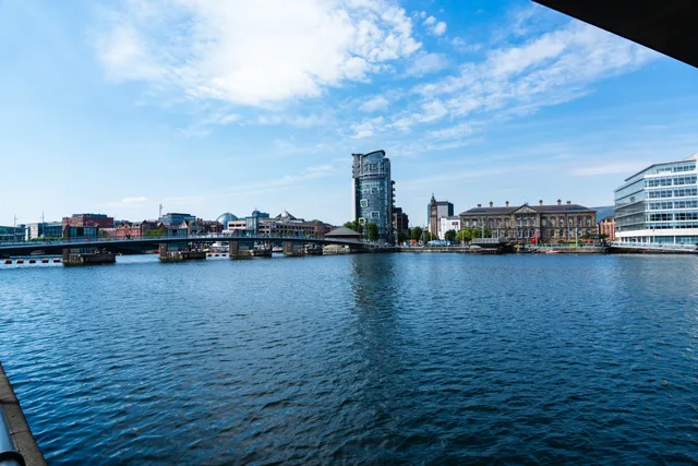 View of the Lagan River with the Belfast skyline, showcasing modern and historic architecture. Belfast lead generation across the Irish border, UK and EU data rules