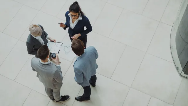 Group of business professionals collaborating in an office setting. The England lead network market shows a prospect base, not a market value